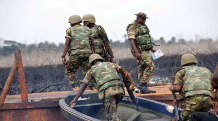 You are currently viewing Military attacks militants, pirates, destroys illegal oil facilities in Niger Delta